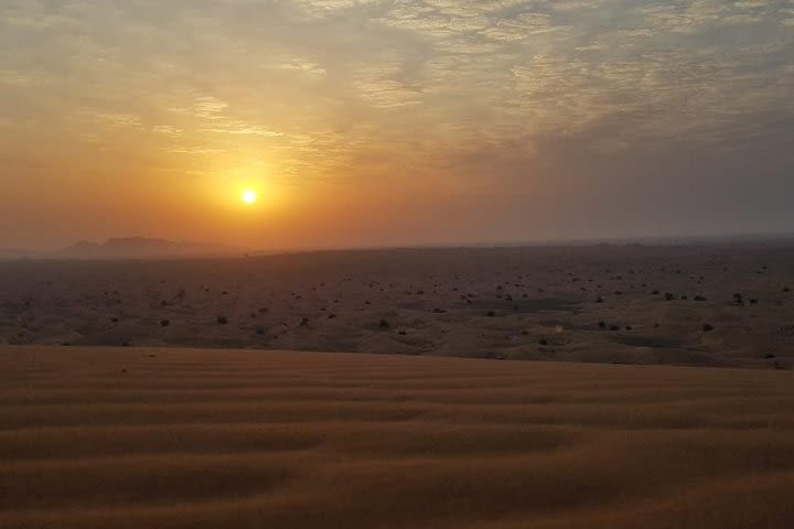 Sunrise View Desert Safari with Dune Bashing and Sand Boarding image