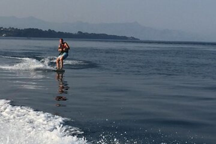 Day in a dinghy along the Catanese coast with skipper image