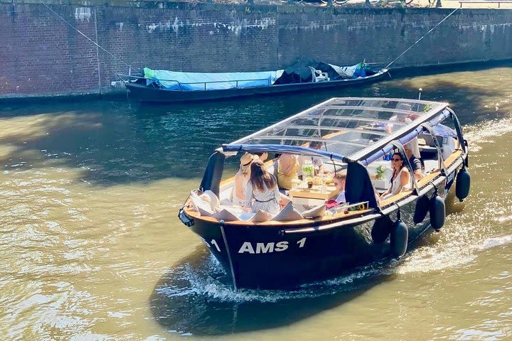 Amsterdam Small-Group Canal Cruise Plus Snacks and Drinks Winter/Light image