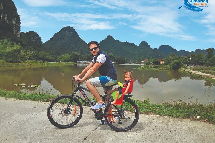 Mua Cave - Tam Coc - Bich Dong Day tour with transfer, local family & bike image