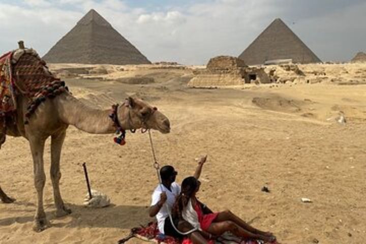 Private Tour to Giza pyramids, Sphinx, Cairo Museum with Camel Ride and Shopping image