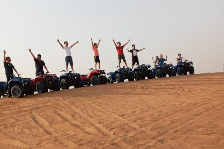 Morning Desert Safari with Quad Biking, Camel Riding, Sand Board All Inclusive image