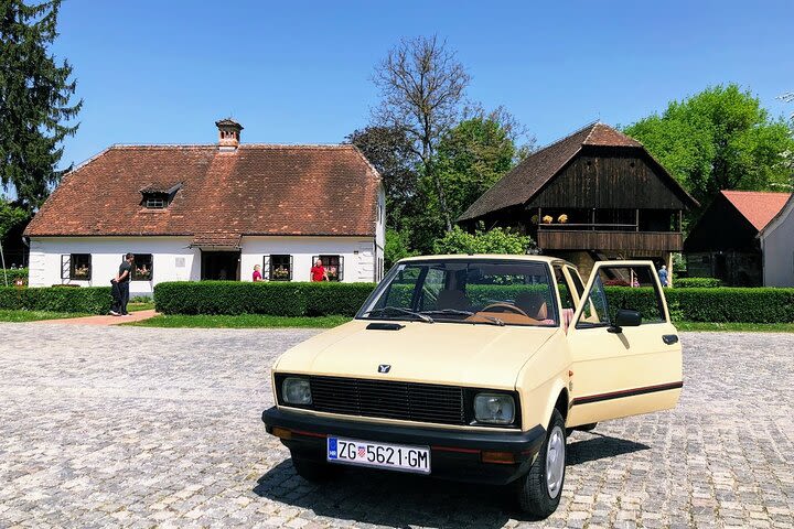 Full Day Tito's Village tour in Old-Timer Yugo car image