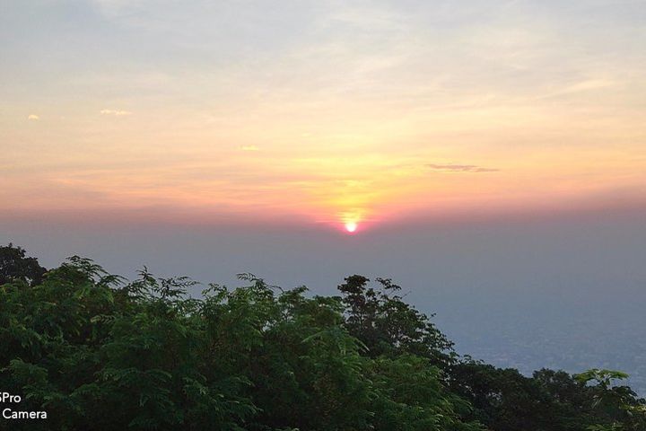 Sunset and Long neck hill tribe plus Amazing local greand temple image