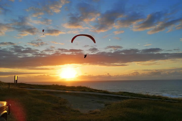 Tandem paragliding flight image