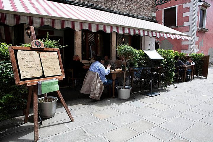 Venetian dinner in a typical Trattoria  image