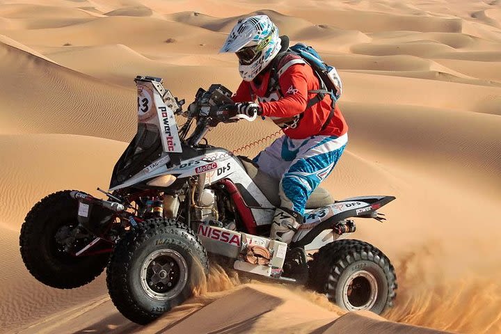 Dubai: Evening Desert Safari + 30 Mins Quad Bike, Dune Bashing & BBQ Dinner  image