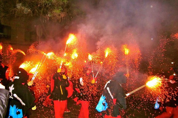 Experience Catalonia: Correfoc Fire Running Festival Experience from Barcelona image