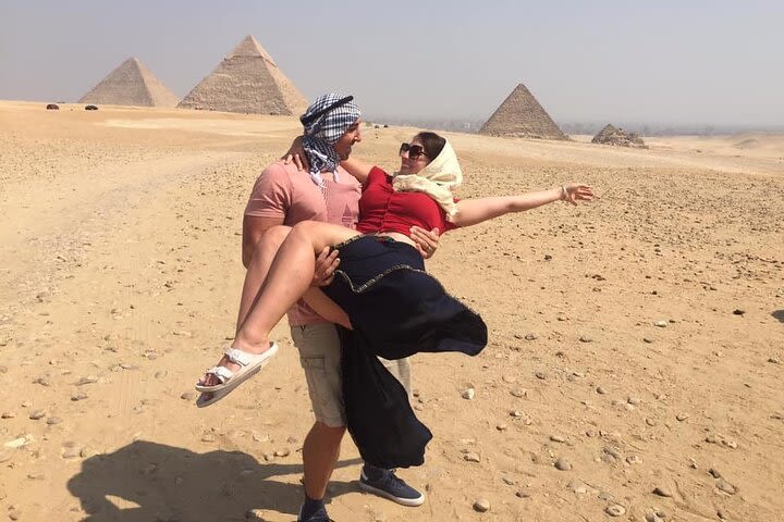  4 Hours private Giza Pyramids ,Sphinx ,lunch and camel ride from Cairo or Giza image