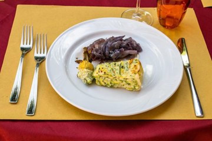 Dining experience at a local's home in Turin with show cooking image