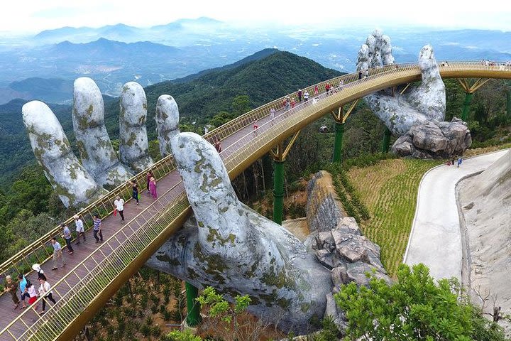 Car transfer from Hue - Golden Bridge in Ba Na Hill - Hoi An or Vice Versa image