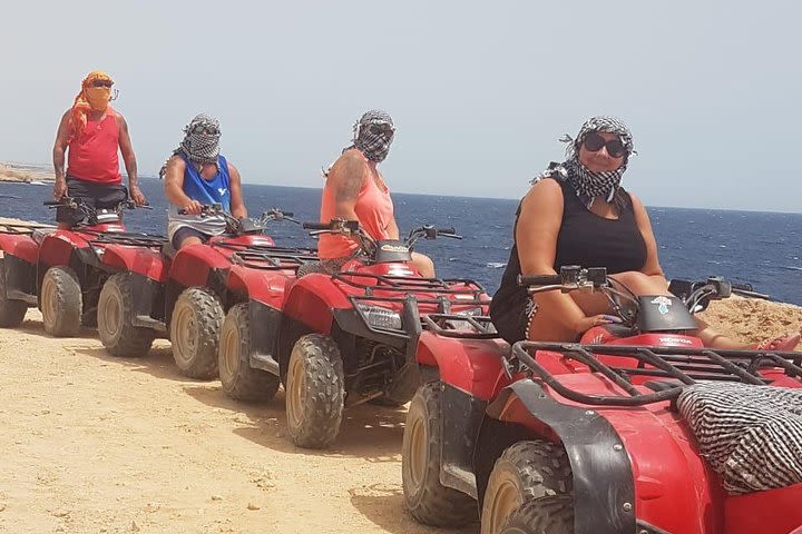 quad bike along coastline  image