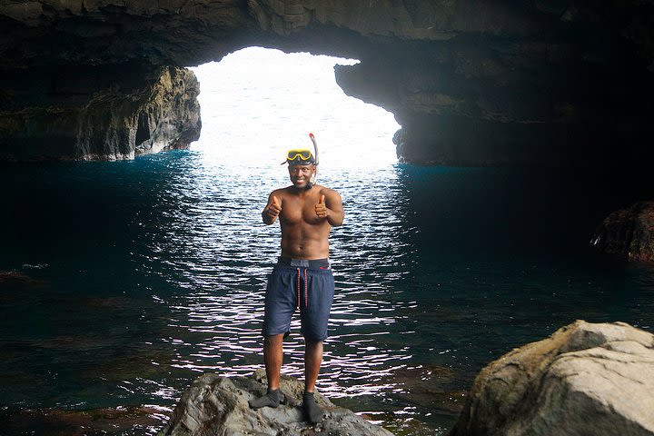 Santiago Island: Boat Trip to the Cave, Snorkeling and Barbecue on the beach image