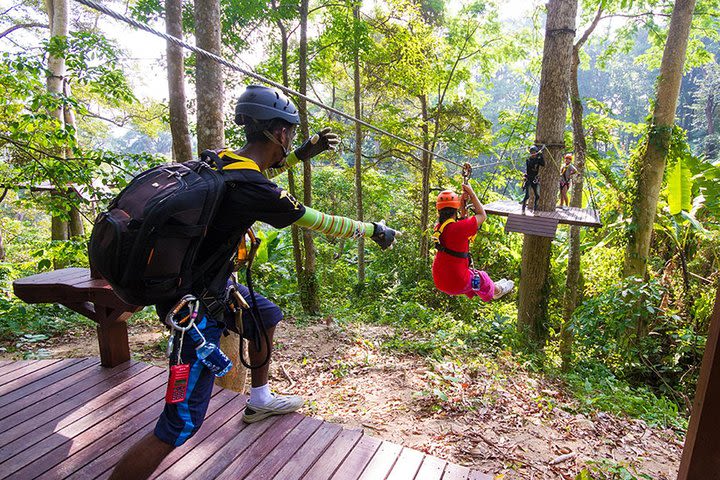 Fly through trees at Flying Hanuman, first zip-line park in Phuket image