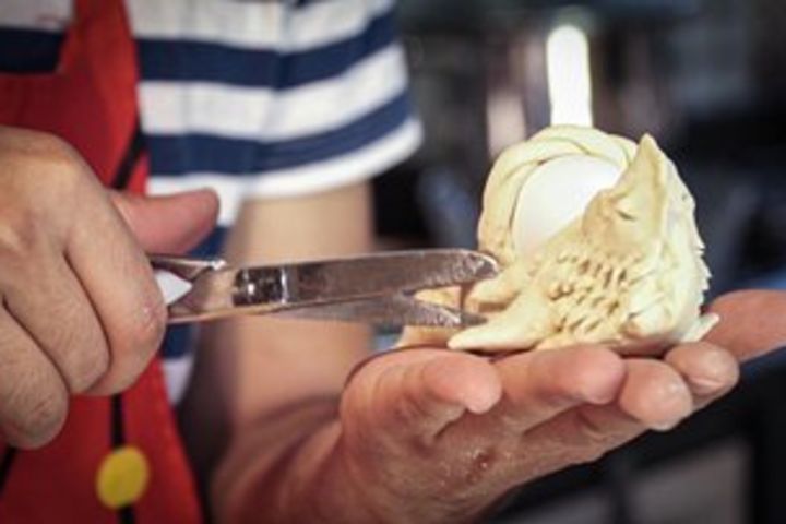 Baking bread experience. Learn how to make traditional Sardinian bread. image