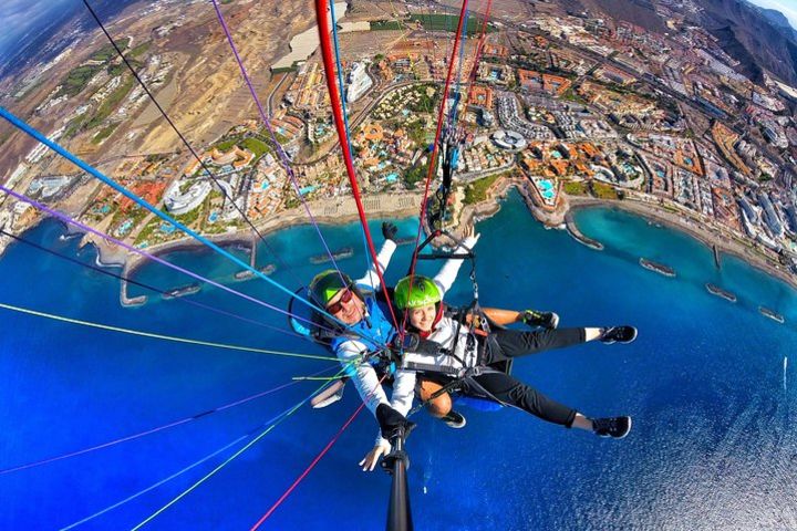 BRONZE paragliding tandem flight above Costa Adeje with free pick up and water image