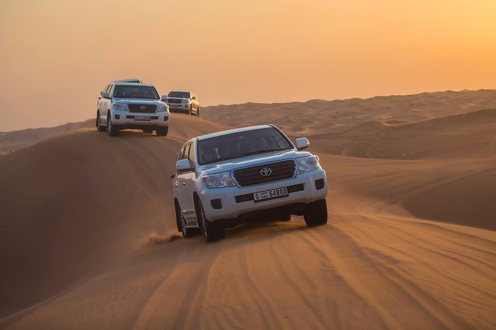 DXB Red Dune Desert Safari, Sand Boarding, Camel Ride, Live Shows, BBQ Dinner image