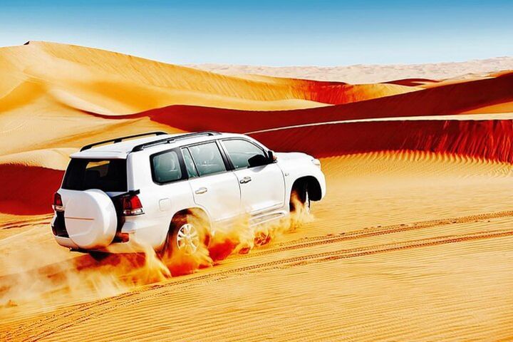 Arabian Desert Safari with BBQ Dinner & Camel Riding image