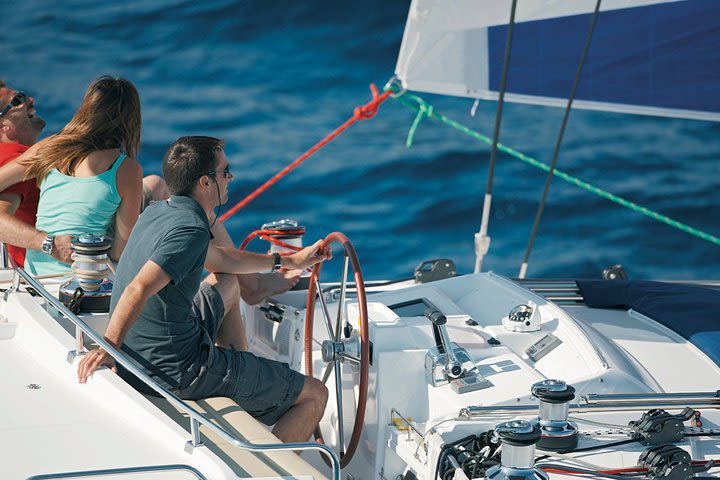 Luxury Catamaran Semi private cruise with meals & drinks and transportation. image