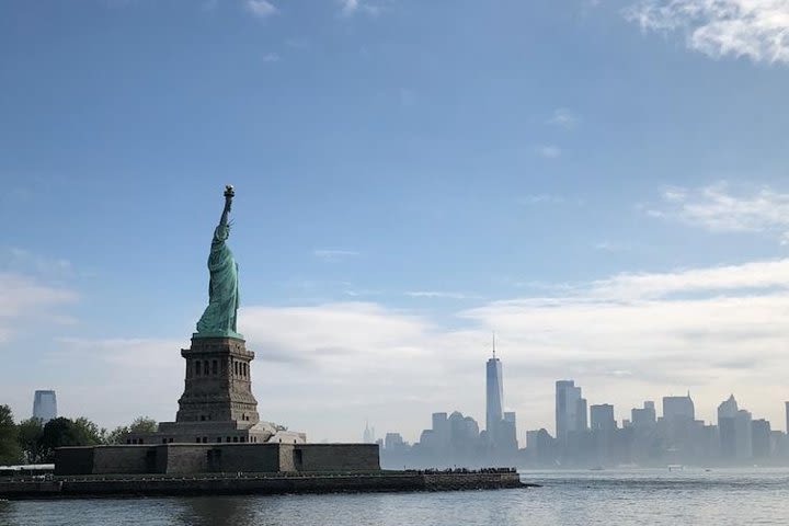 Fun Statue of Liberty and Ellis Island Tour with Energetic University Students image