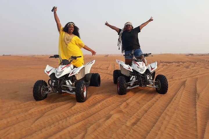 Red Sand Safari, Quad Bike, Live Show, BBQ Dinner, Camel Ride & Sand Board image