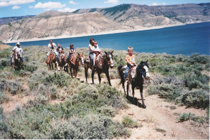 Personalized Horseback Rides around Lake image