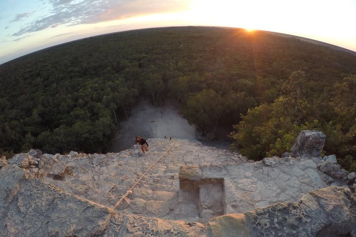 Coba Ruins Sunset Tour by Bike with Cultural or Extreme Activity and Dinner Show image