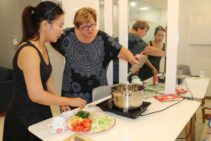 Virtual hand-on Vietnamese cooking class with Vi's family  image