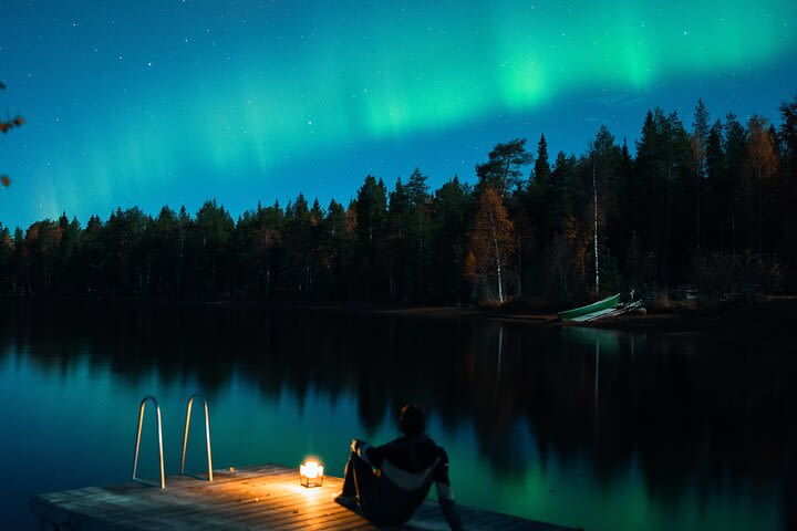 Rovaniemi Northern Lights Hunt with Professional Photographer in a Small Group image