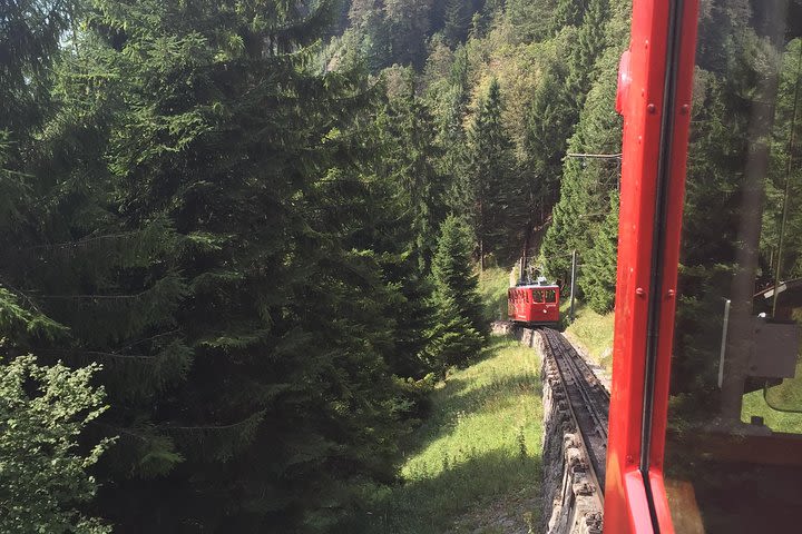 Mount Pilatus golden round trip by boat, coghweel and dragon ride cable car image