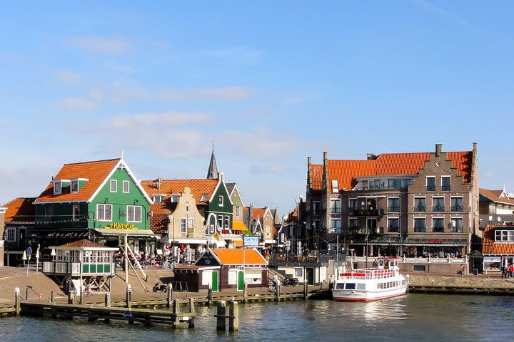 Eat Dutch cheese, explore the countryside and windmills on this private tour image