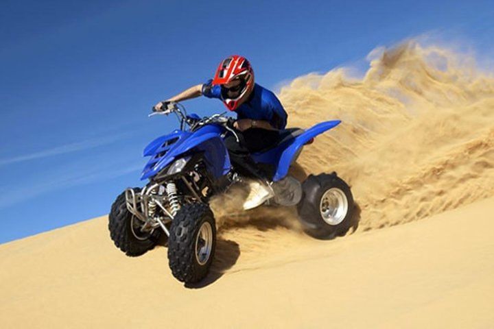 Evening Desert Safari with Quad Bike, Dune Bashing, Camel Ride, Shows, Dinner image