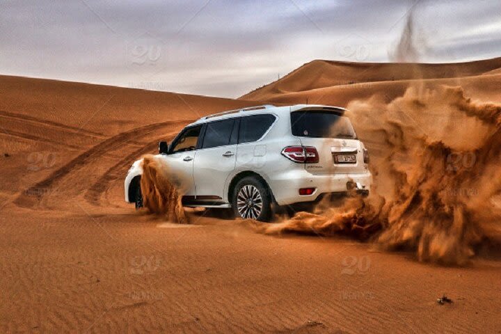 Dubai Desert Safari with camel ride and sand boarding experience  image