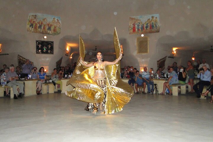 Dinner with traditional dance shows in cave restaurants image