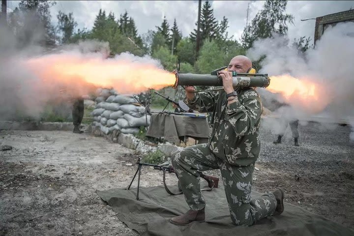 Tank riding and AK-47 shooting in Moscow image