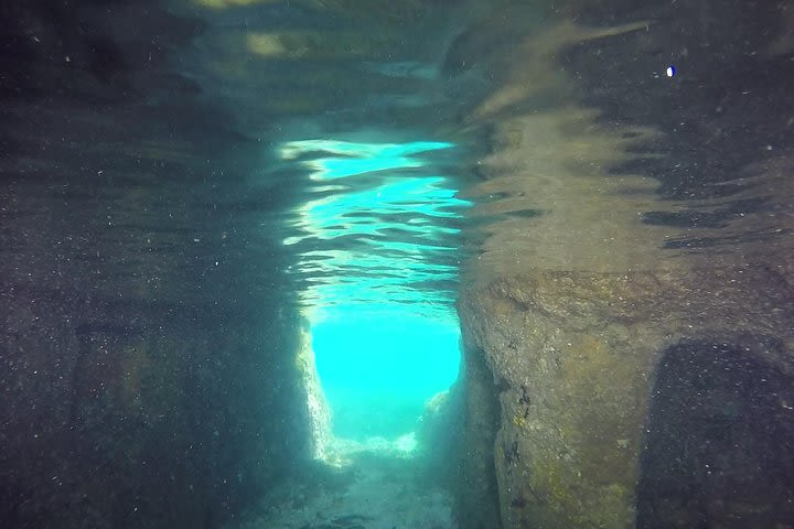 Snorkeling among the Underwater Caves of Ischia Ponte image