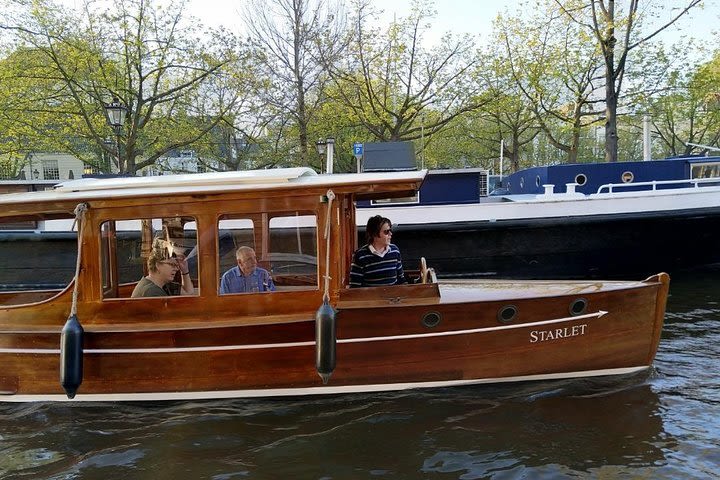 Private boat! 1921 Canal Limousine incl. drinks! 60 min. cruise €225,- 6 persons image