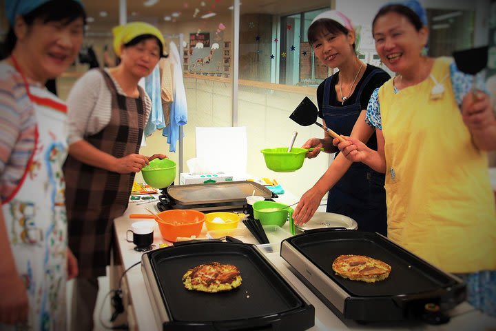 Experience Tokyo through Walking and Okonomiyaki image