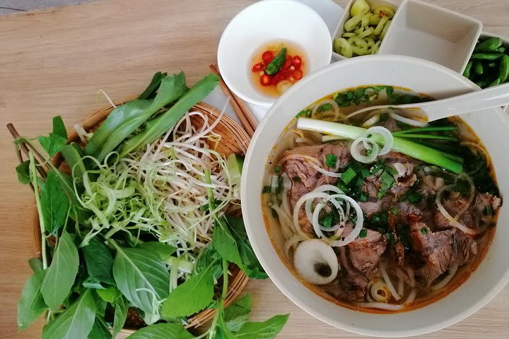 Sightseeing + Saigon Street Food Tour In One  image