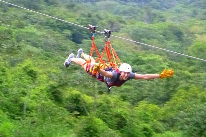 Arenal Full day Adventure:Canopy Tour, Superman, Tarzan Swing, Canyoning Rafting image