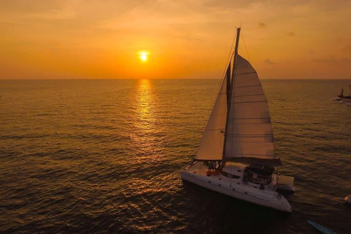 Sunset Catamaran Cruise to Coral Island image