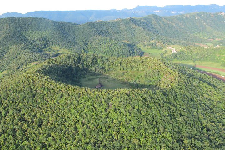 Volcanic Trekking: Volcano, Forest and Waterfall Day Trip from Girona with Lunch image