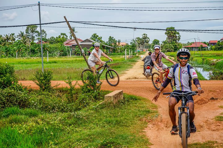 Cycle the Floating Village & Sunset Cruise image