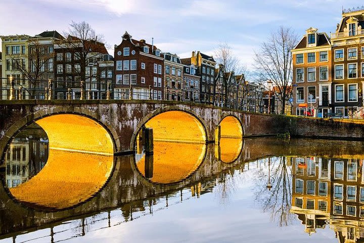 The glory of Holland: Amsterdam and windmills galore image