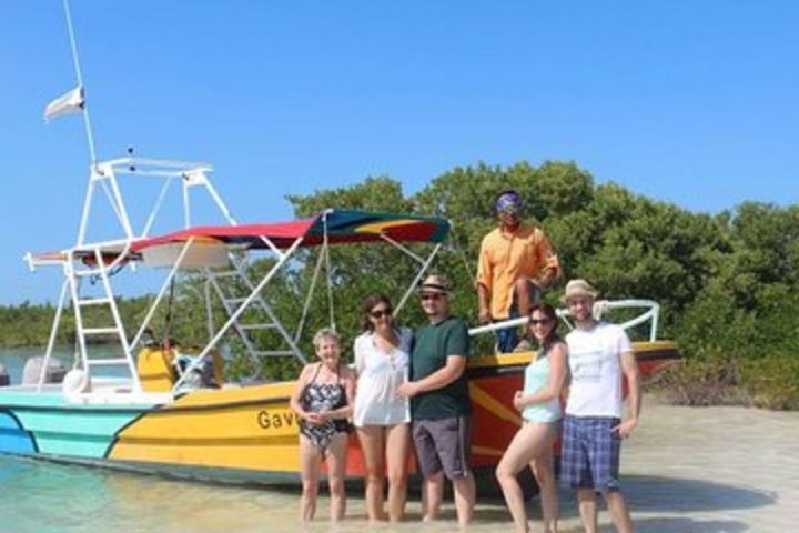 Relaxing tour to Cabo Catoche with fishing and snorkeling on a shared boat image