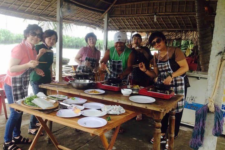 Hoi An Basket Boat Tour & cooking class(local market, boating, fishing crab...) image