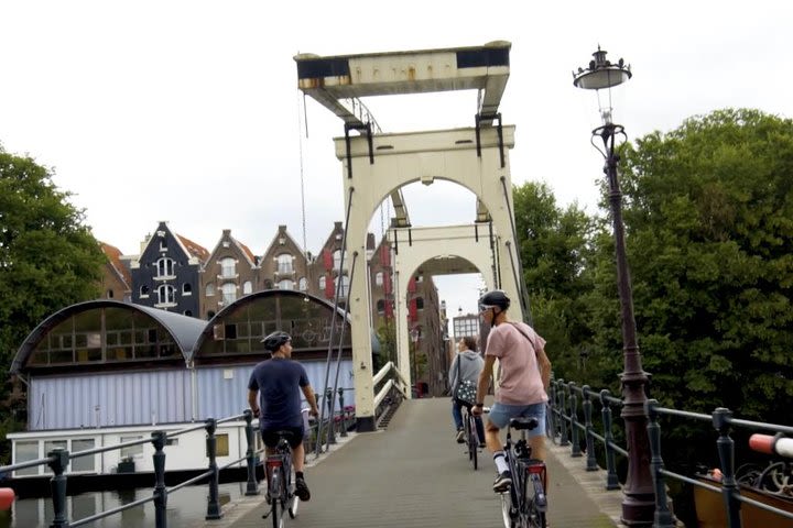 Explore hidden art and culture in Amsterdam by bike image