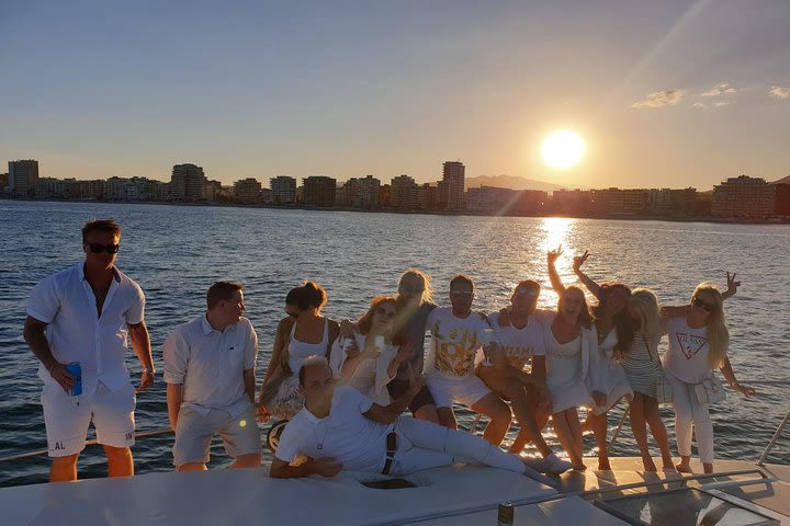 Sunset on board a 15 meter yacht with a glass of cava image