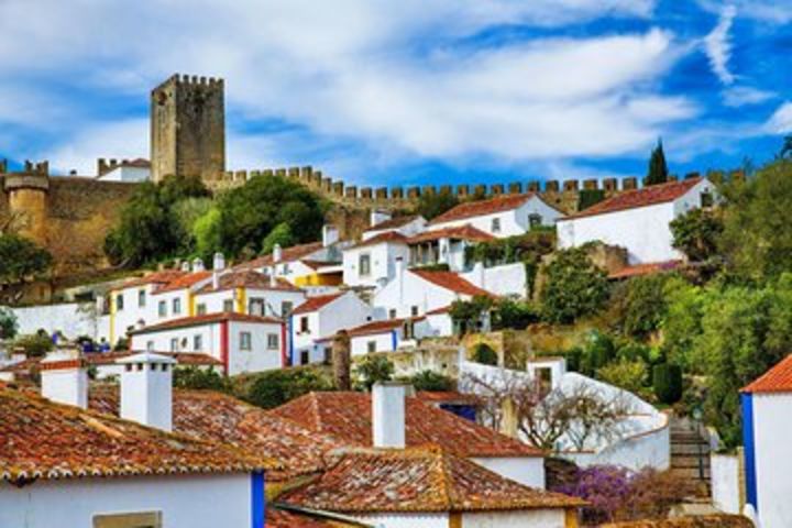 From Lisbon: Fátima, Óbidos Medieval, Nazaré Atlantic Coast image