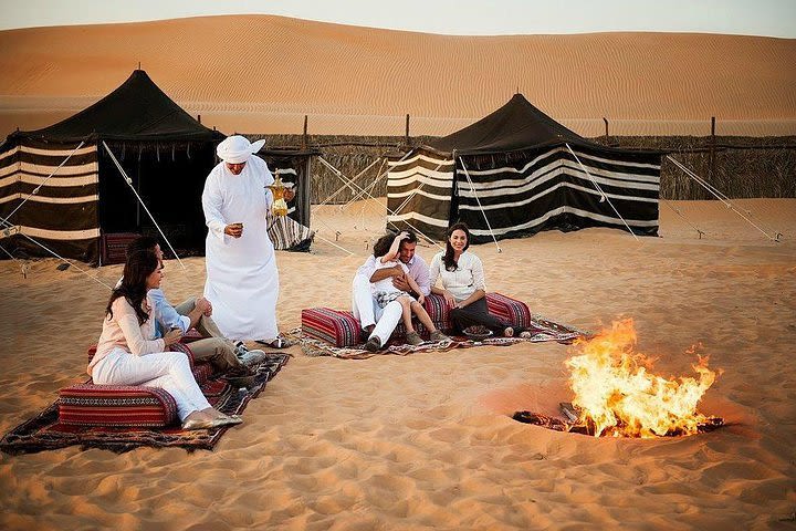 Morning Dubai Desert Safari with Dune Bashing & Sandboarding & Camel Riding image